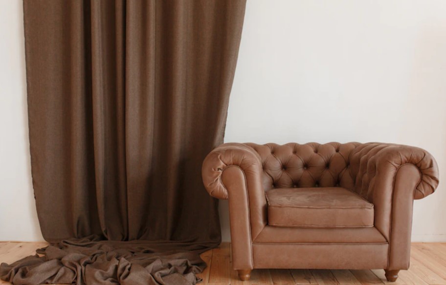What characteristics make brown an ideal color for furniture